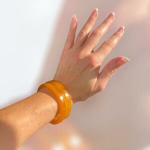 Pair of Yellow/Orange Bakelite Bangles